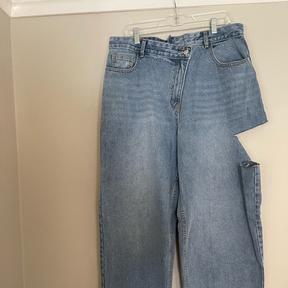 Light blue wash low rise baggy jeans with asymmetric waist size 12